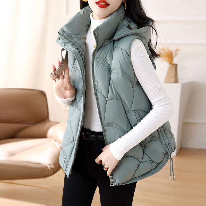 Women's quilted padded gilet with hood, zip front and patch pockets