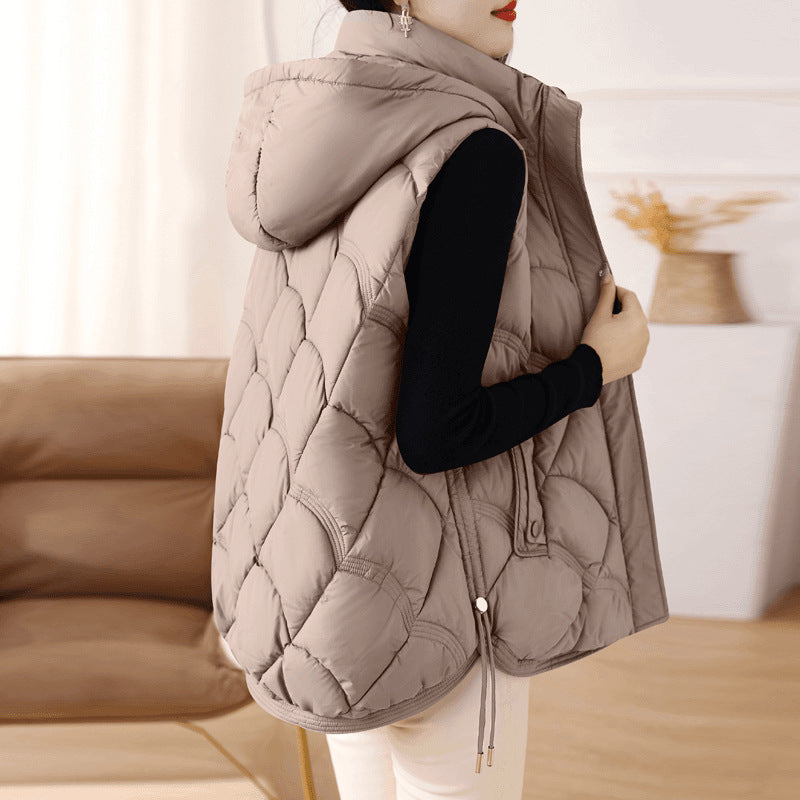 Women's quilted padded gilet with hood, zip front and patch pockets