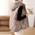 Women's quilted padded gilet with hood, zip front and patch pockets