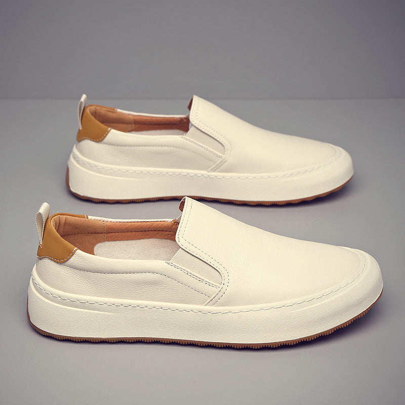 Slip-on loafers with contrast soles, stitched panels and rear pull tabs