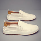 Slip-on loafers with contrast soles, stitched panels and rear pull tabs