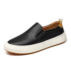 Slip-on loafers with contrast soles, stitched panels and rear pull tabs