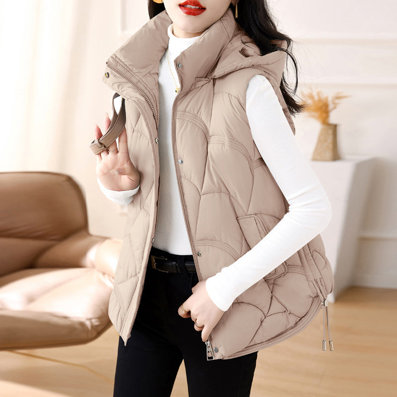 Women's quilted padded gilet with hood, zip front and patch pockets