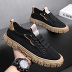 Low-top lace-up sneakers with panelled uppers and thick textured soles