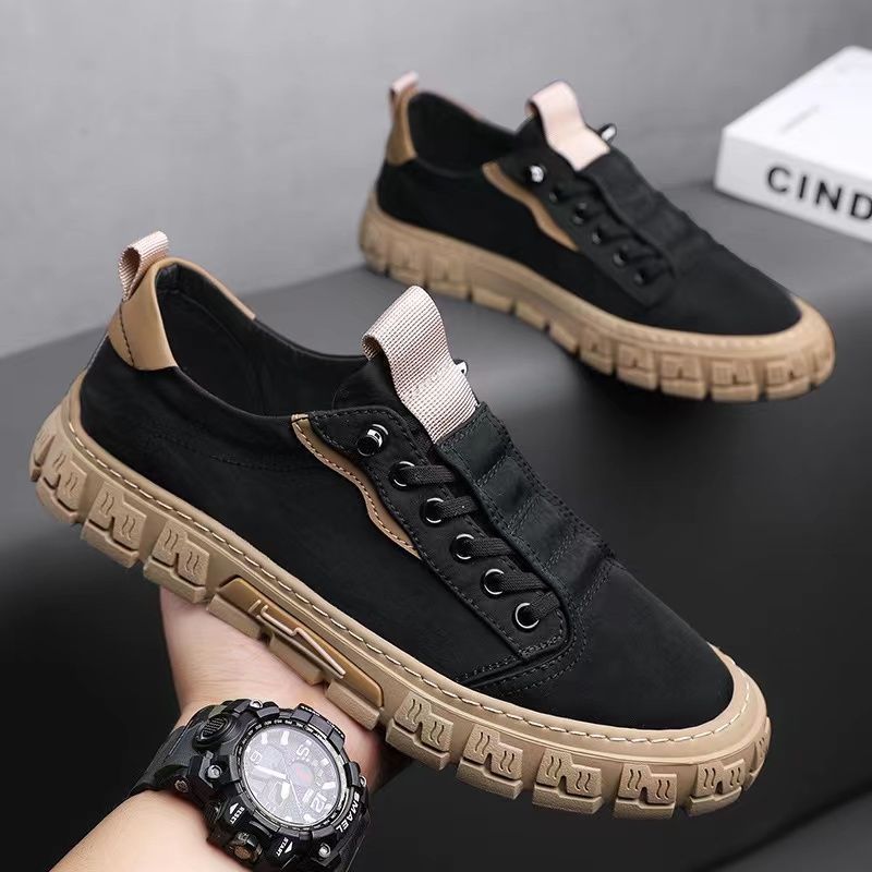 Low-top lace-up sneakers with panelled uppers and thick textured soles