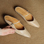 Women's pointed ballet flats with buckle straps and low heels