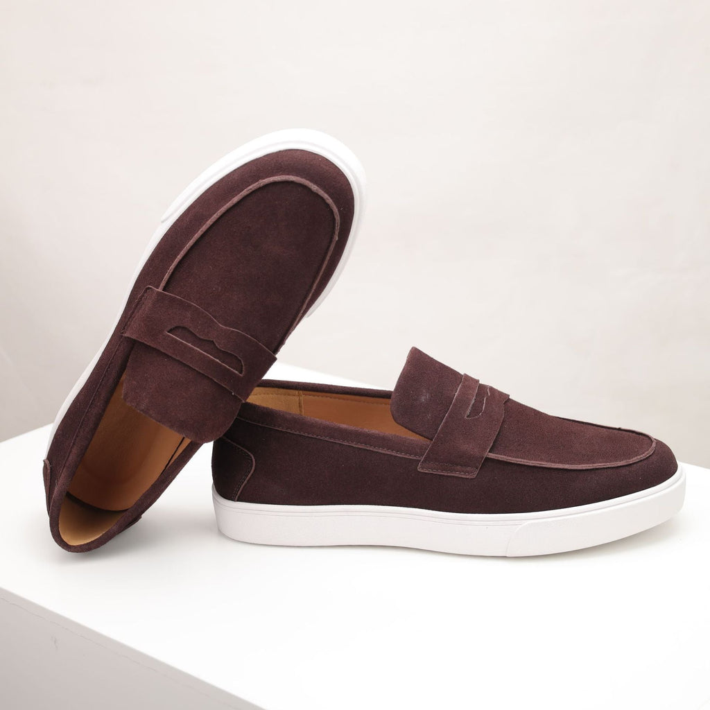 Men's textured penny loafers with rounded toes and white flat soles