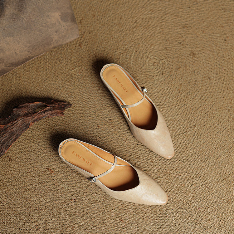 Women's pointed ballet flats with buckle straps and low heels