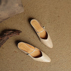 Women's pointed ballet flats with buckle straps and low heels