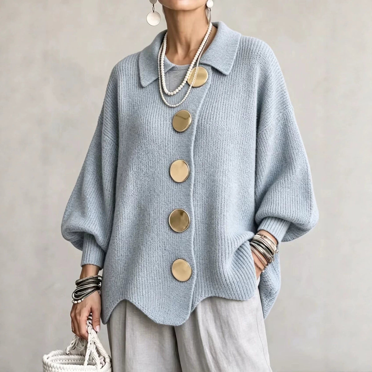 Women's oversized ribbed cardigan with collared neckline and button front