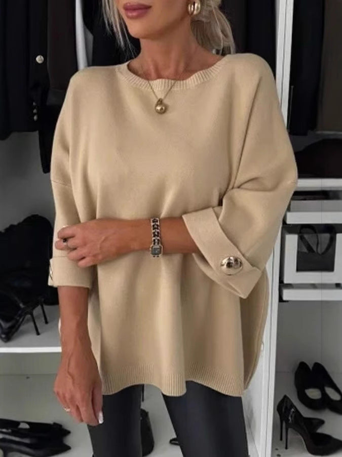 Women's knitted jumper with round neckline, three-quarter sleeves and button cuffs