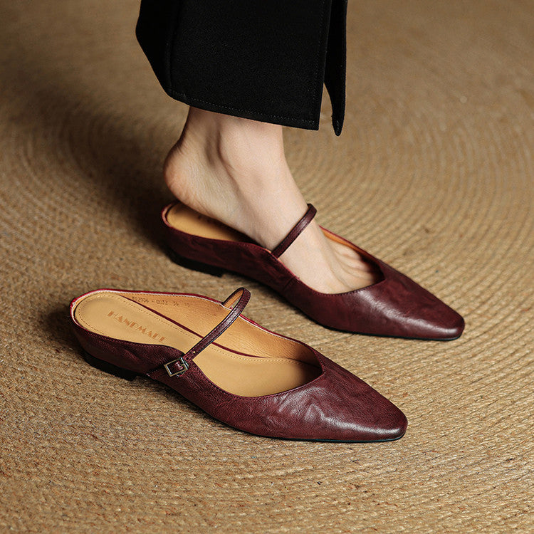 Women's pointed ballet flats with buckle straps and low heels