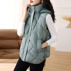 Women's quilted padded gilet with hood, zip front and patch pockets