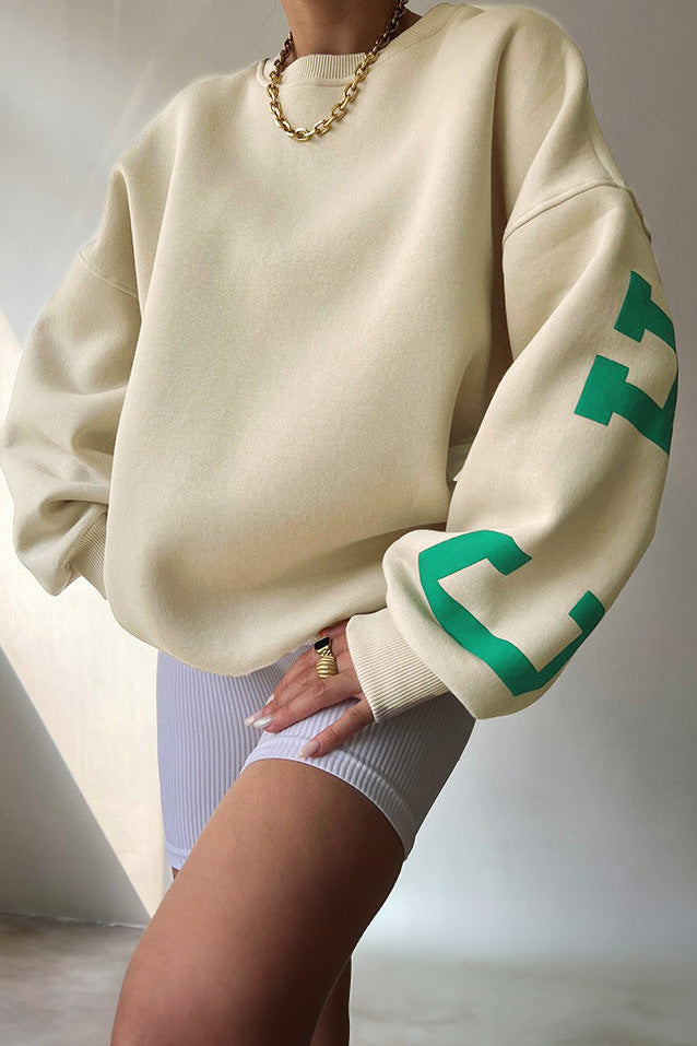 Women's crewneck sweatshirt with bold letter graphics on the long sleeves