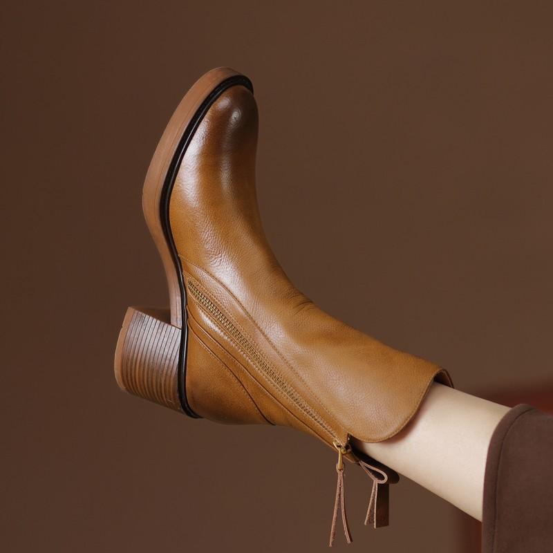 Women's ankle boots with side zips, almond toes and ribbed block heels