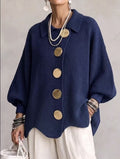 Women's oversized ribbed cardigan with collared neckline and button front