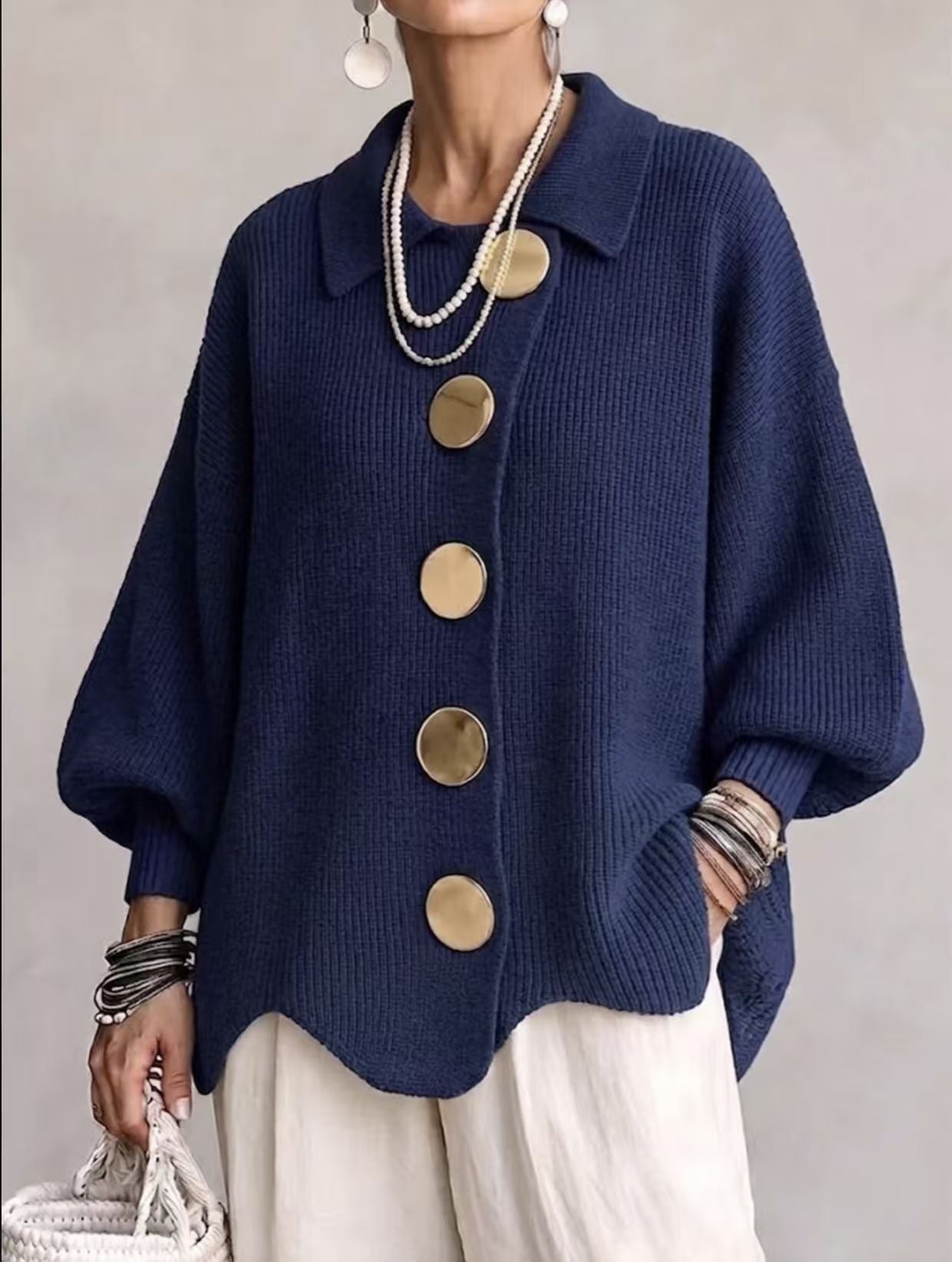 Women's oversized ribbed cardigan with collared neckline and button front