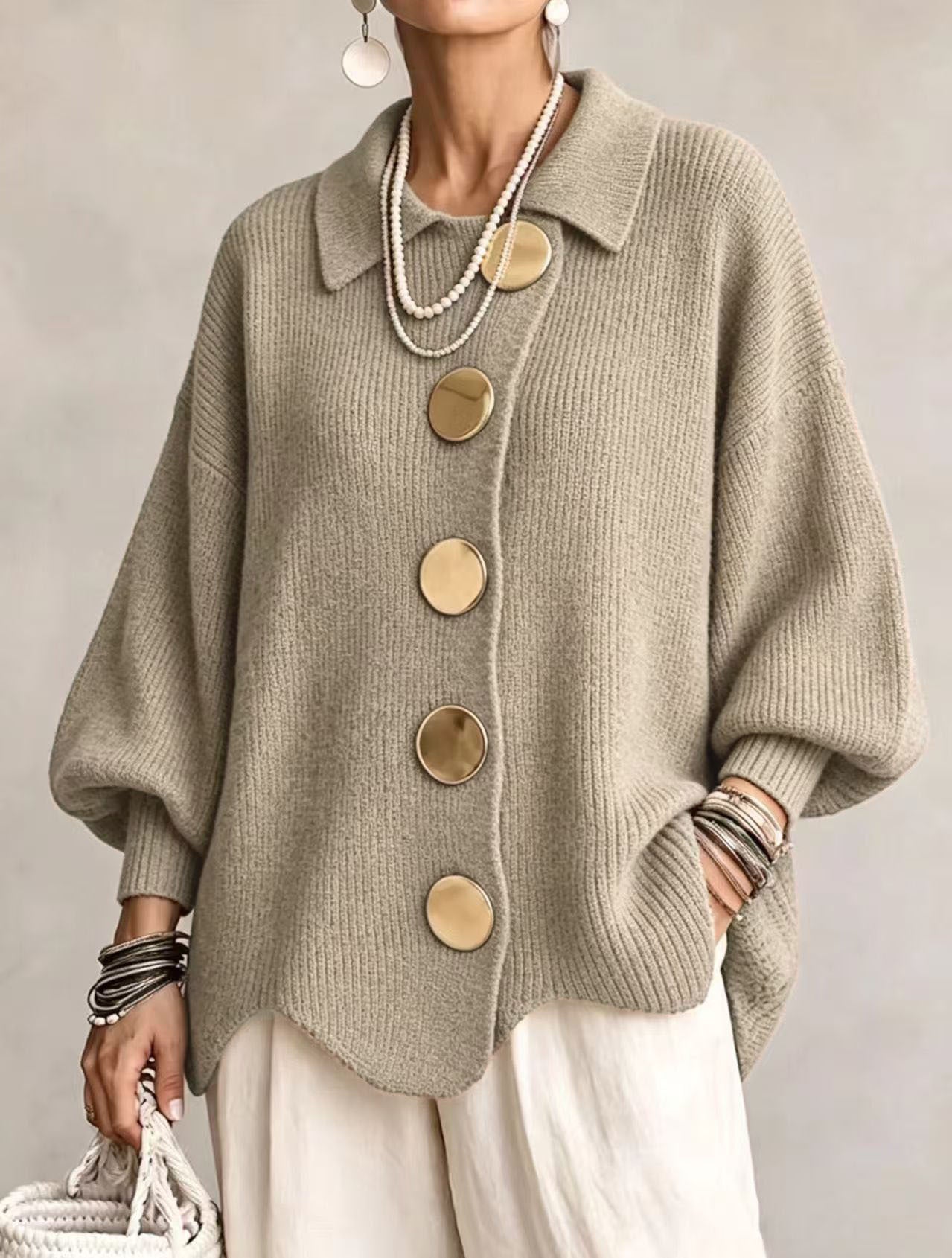 Women's oversized ribbed cardigan with collared neckline and button front