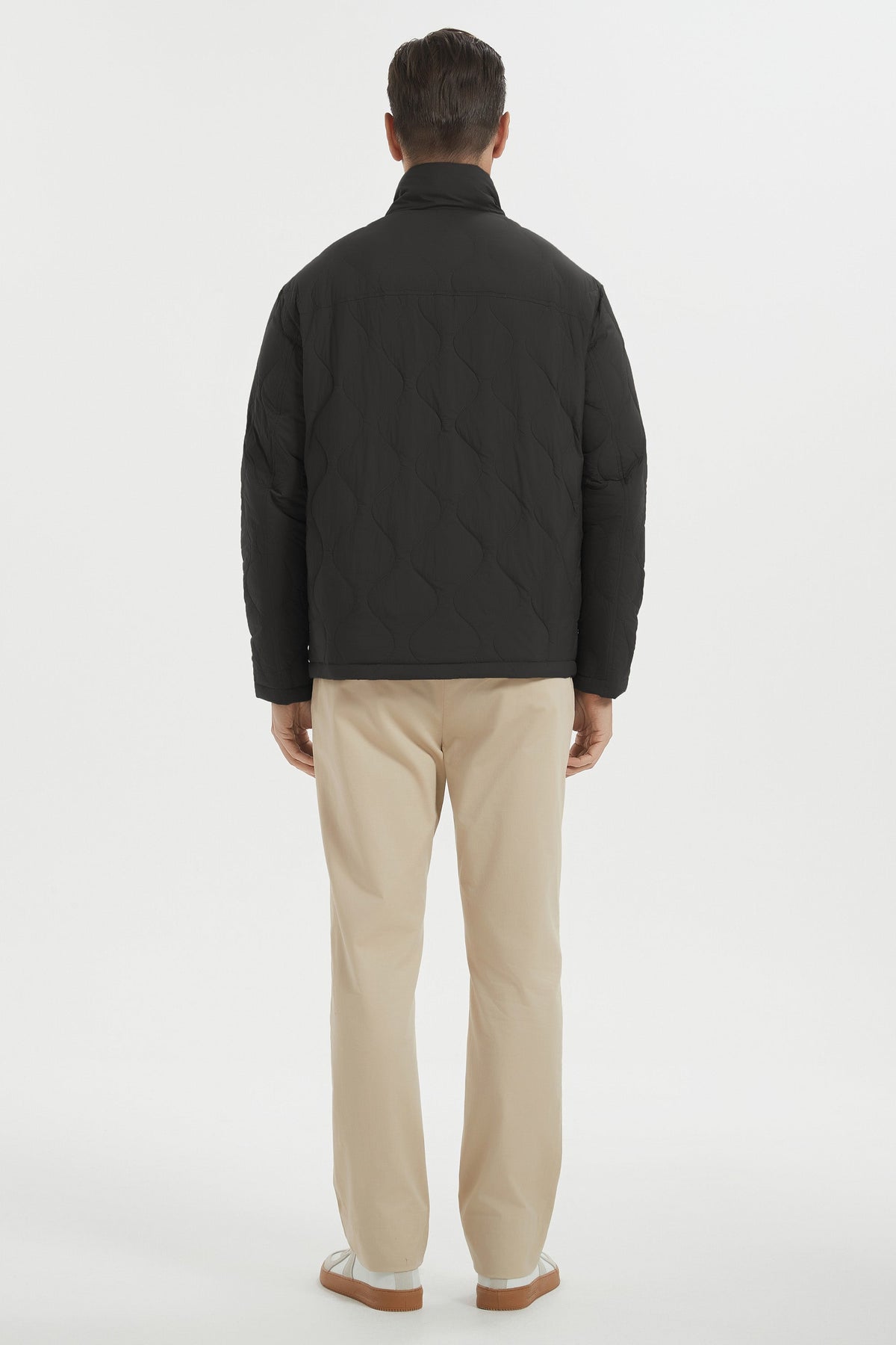 Men's quilted padded bomber jacket with high collar and full zip fastening