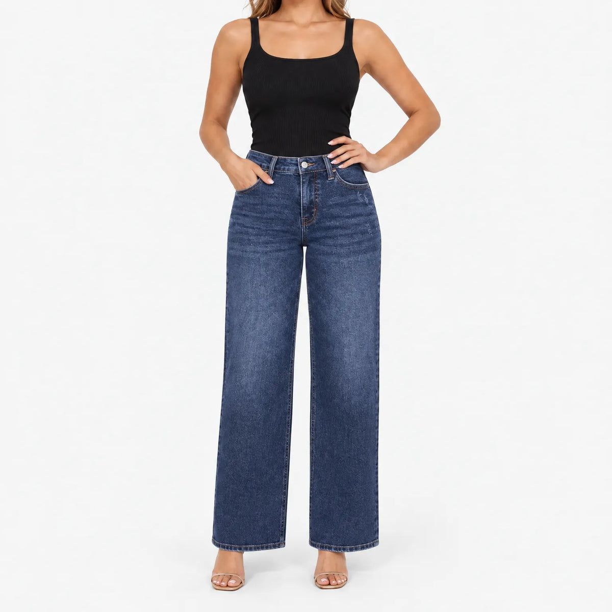 Women's light washed wide leg jeans with a mid-rise waist and five-pocket design