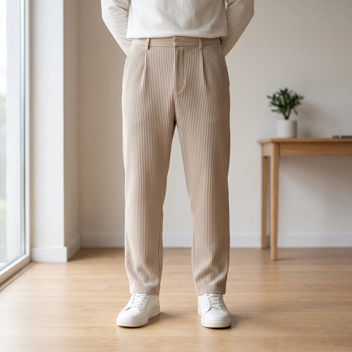 Men's textured pleated trousers with an elasticated waistband and straight legs