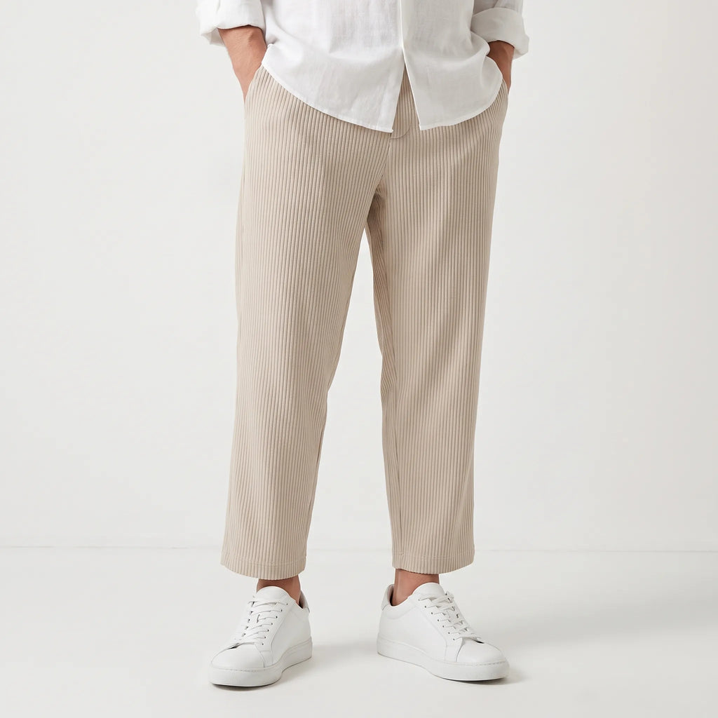 Men's textured pleated trousers with an elasticated waistband and straight legs
