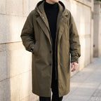 Men's long hooded coat with zip front, button placket and flap pockets