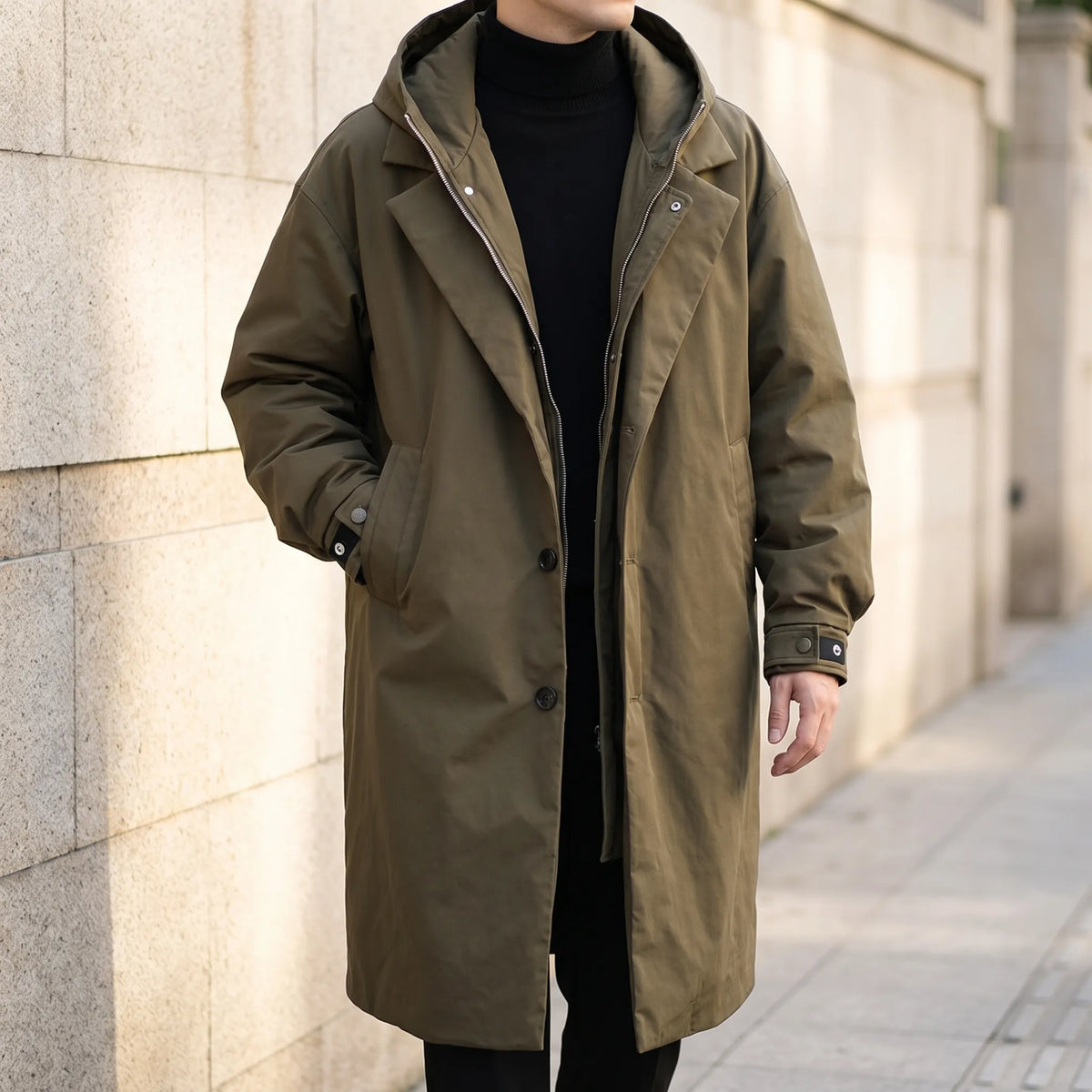 Men's long hooded coat with zip front, button placket and flap pockets