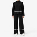 Women's black and white striped mock neck co-ord set with wide-leg trousers