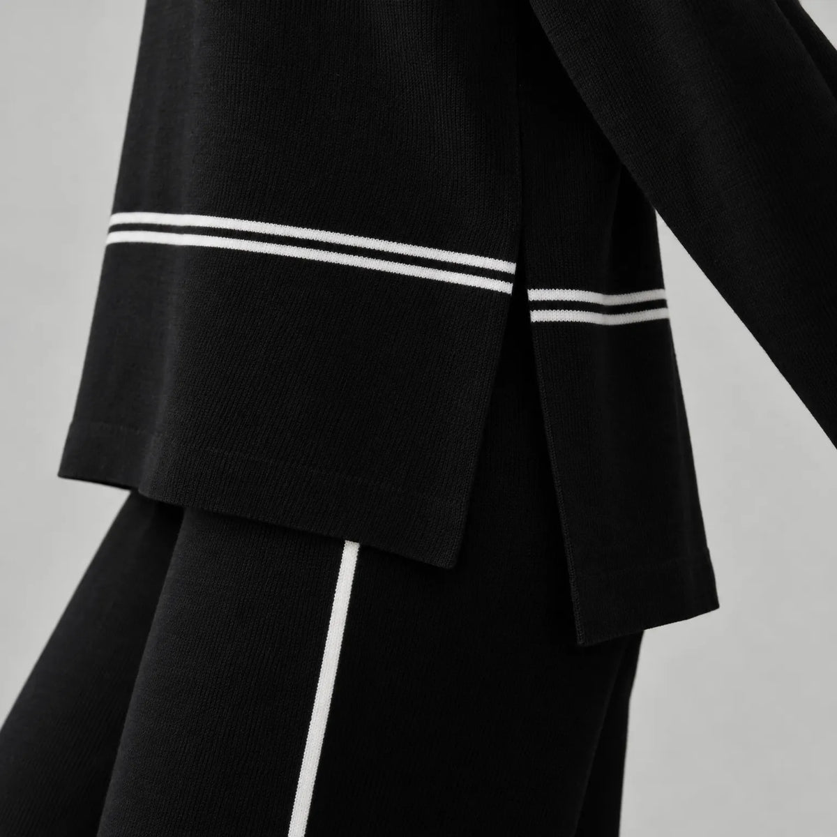 Women's black and white striped mock neck co-ord set with wide-leg trousers