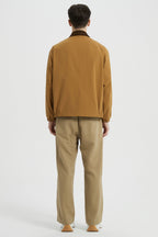 Men's solid bomber jacket with collared neckline, zip front and long sleeves
