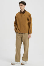 Men's solid bomber jacket with collared neckline, zip front and long sleeves