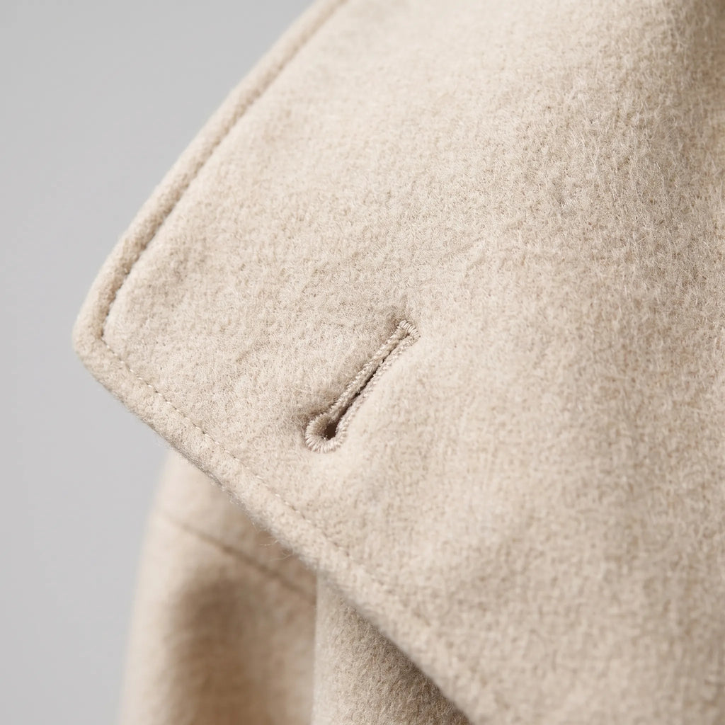 Women's short double-breasted jacket with oversized stand collar and long sleeves