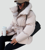 Women's quilted puffer jacket with high collar and belted waist