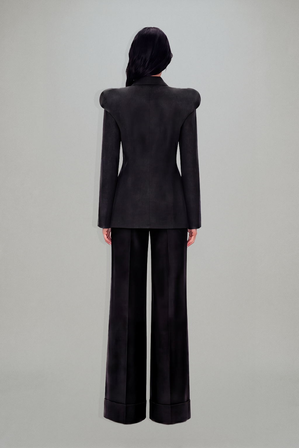 Women's charcoal fitted blazer with structured shoulders and peak lapels
