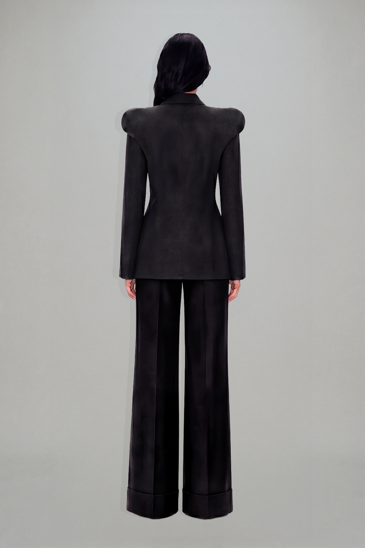 Women's charcoal fitted blazer with structured shoulders and peak lapels