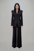 Women's charcoal fitted blazer with structured shoulders and peak lapels