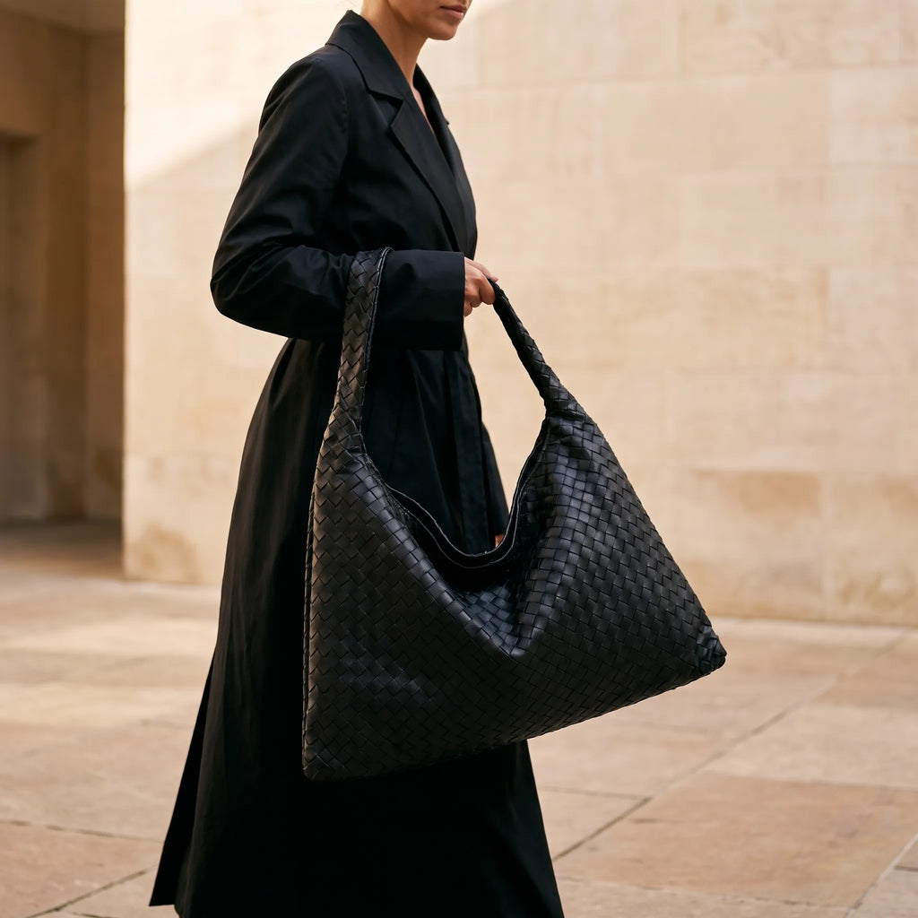 Oversized woven shoulder tote bag with a slouchy shape