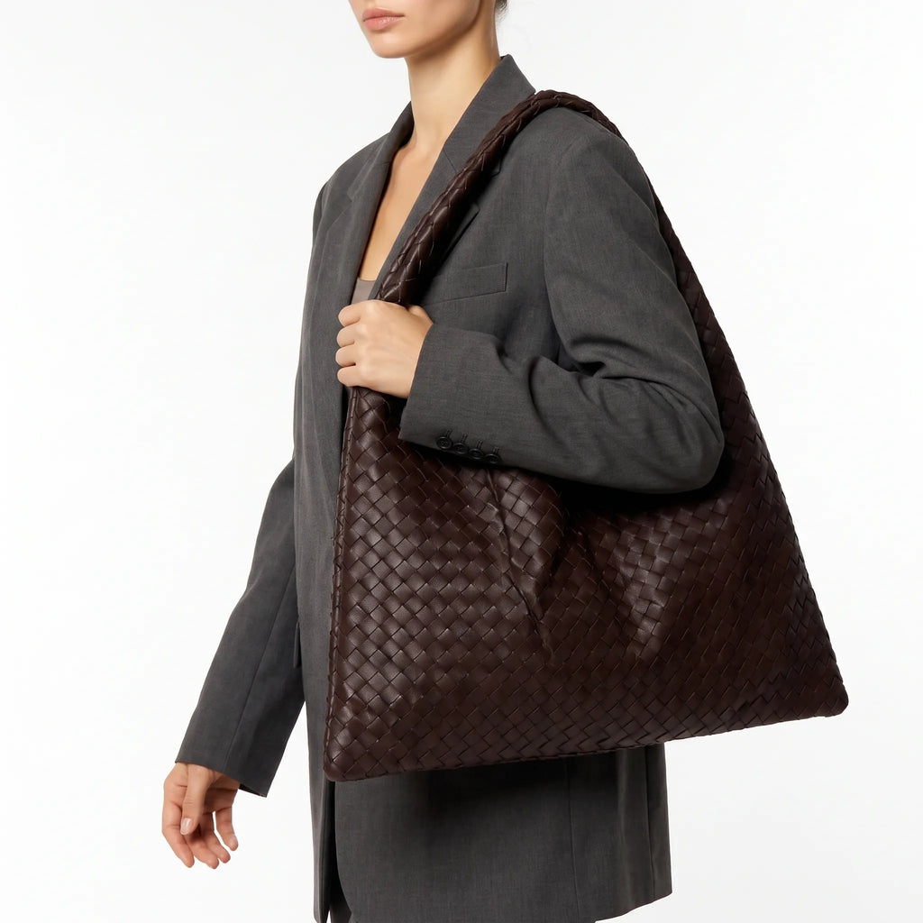 Oversized woven shoulder tote bag with a slouchy shape