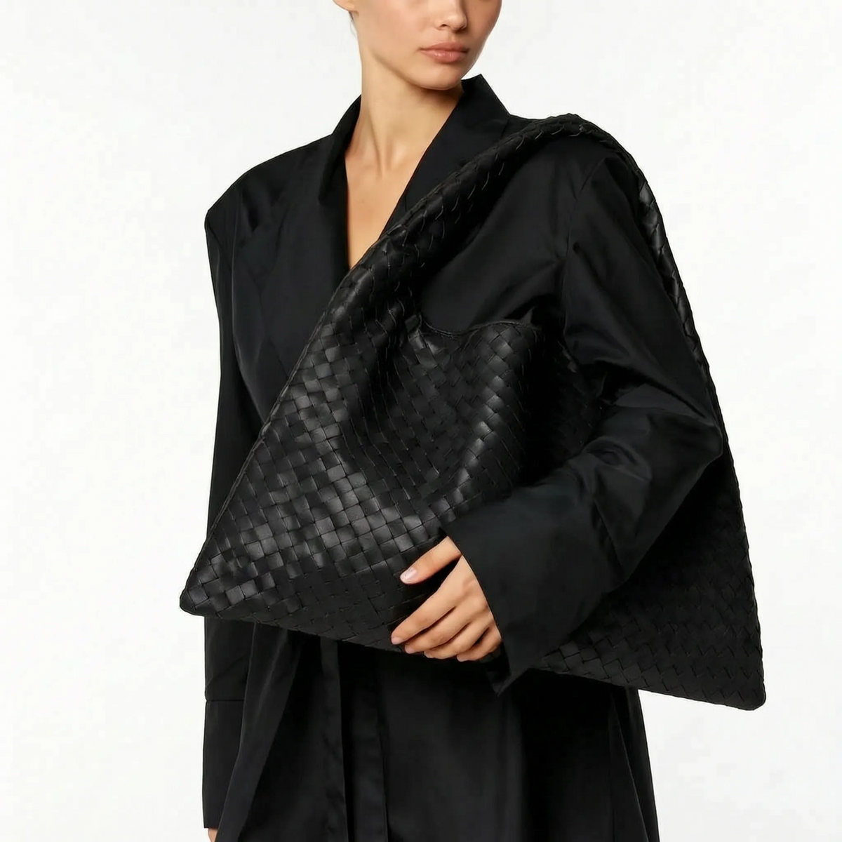 Oversized woven shoulder tote bag with a slouchy shape