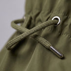 Women's hooded raincoat jacket with drawstring waist and front pockets