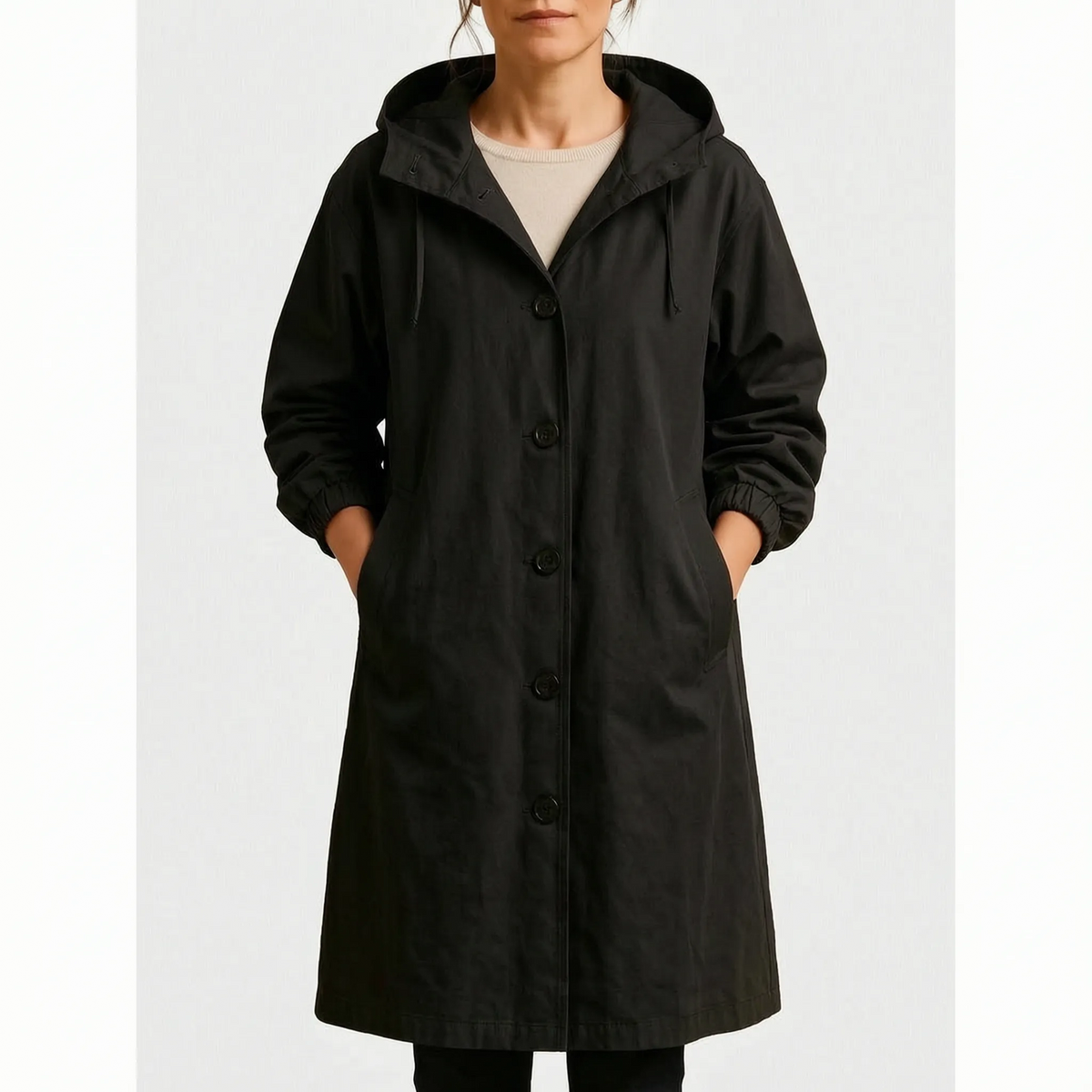 Women's long hooded waterproof coat with button front and pockets