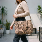 Women's ribbed leopard print tote bag with multiple front pockets and shoulder strap