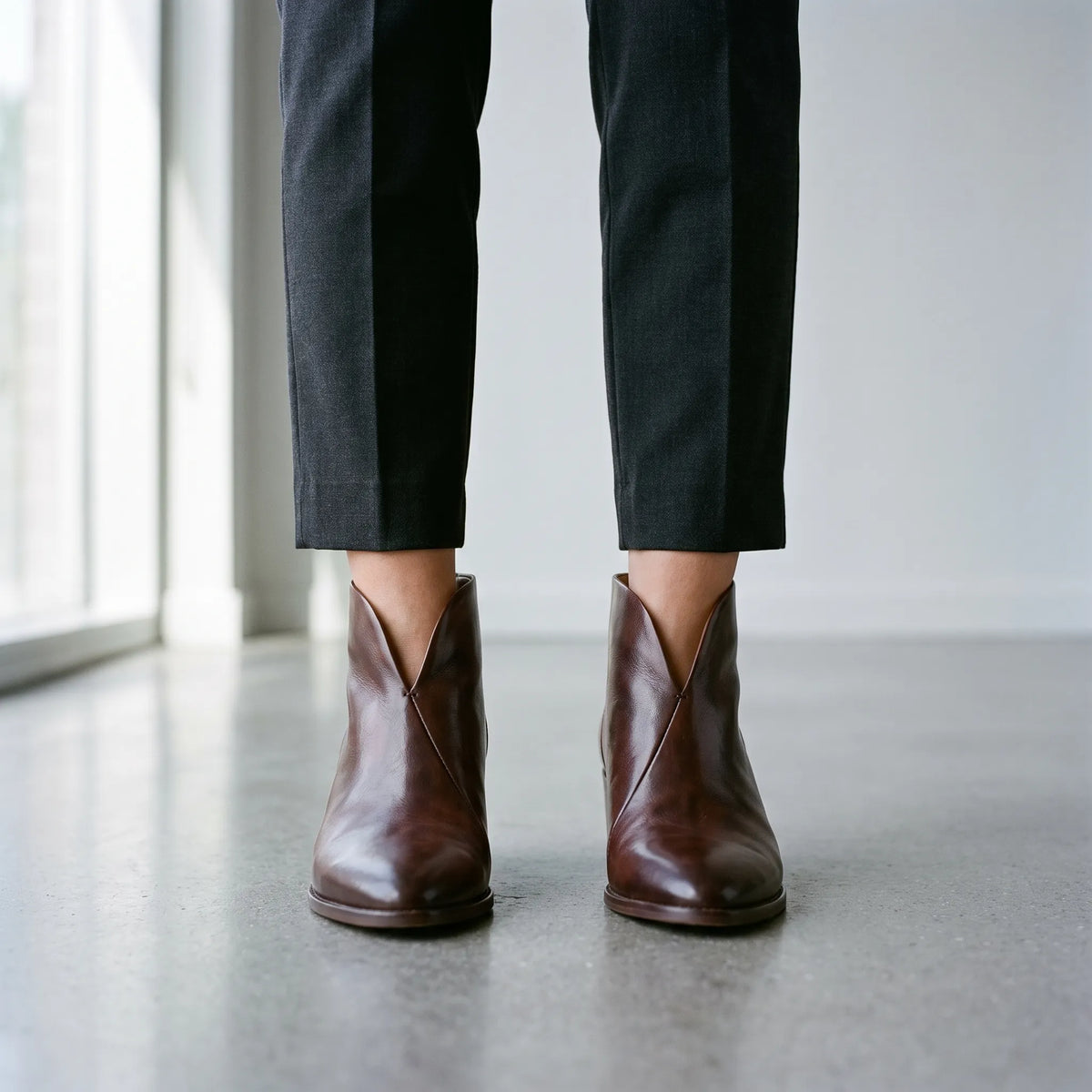 Women's pointed-toe ankle boots with V-cut fronts and block heels