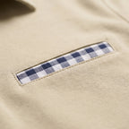 Men's long sleeve polo shirt with gingham collar and chest pocket detail