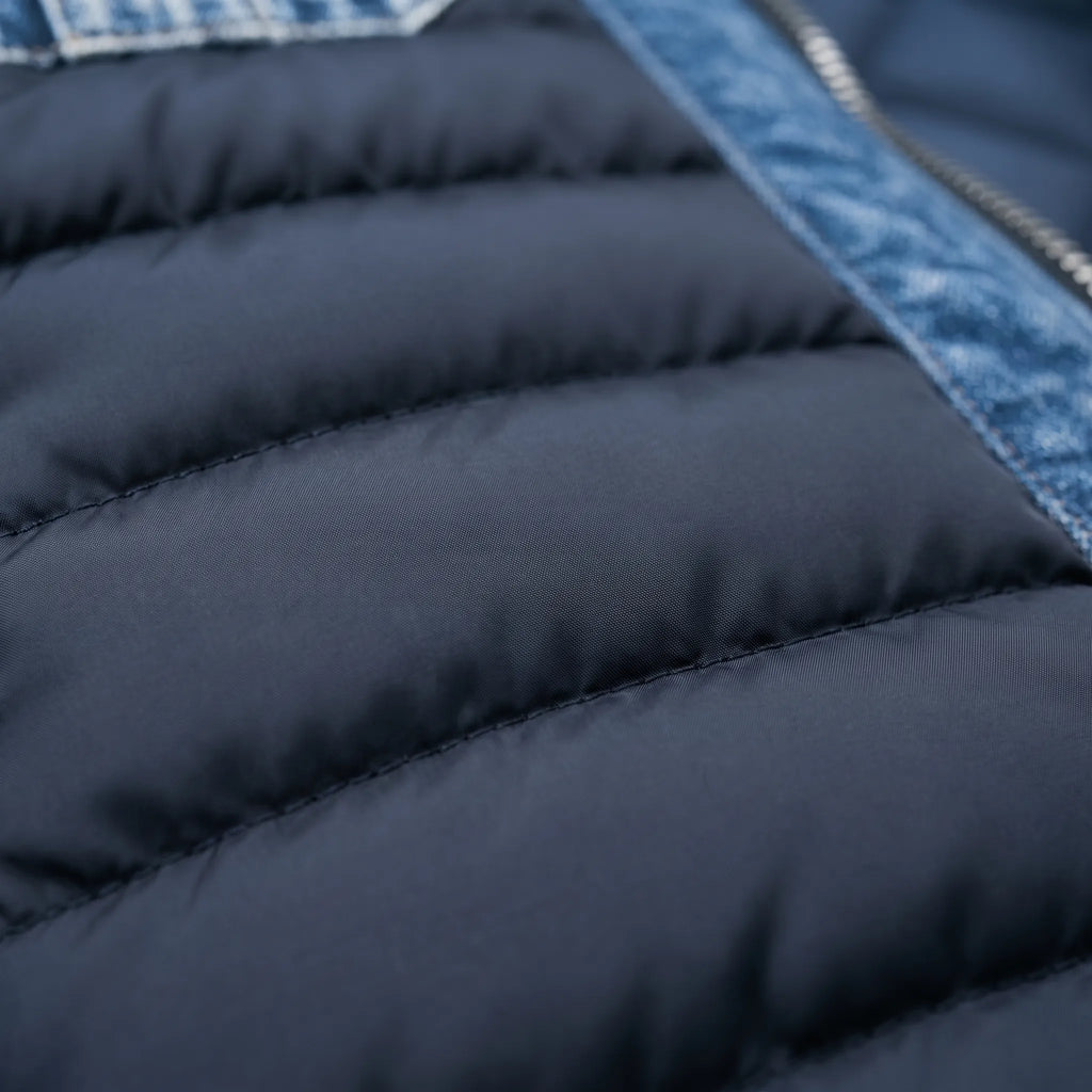 Men's navy quilted jacket with blue denim-look panels and chest pockets