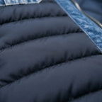 Men's navy quilted jacket with blue denim-look panels and chest pockets