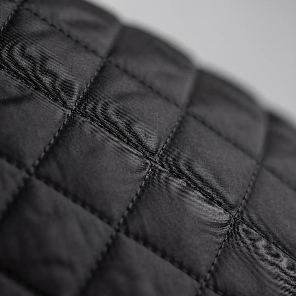 Men's diamond quilted padded jacket with stand collar and zip pockets