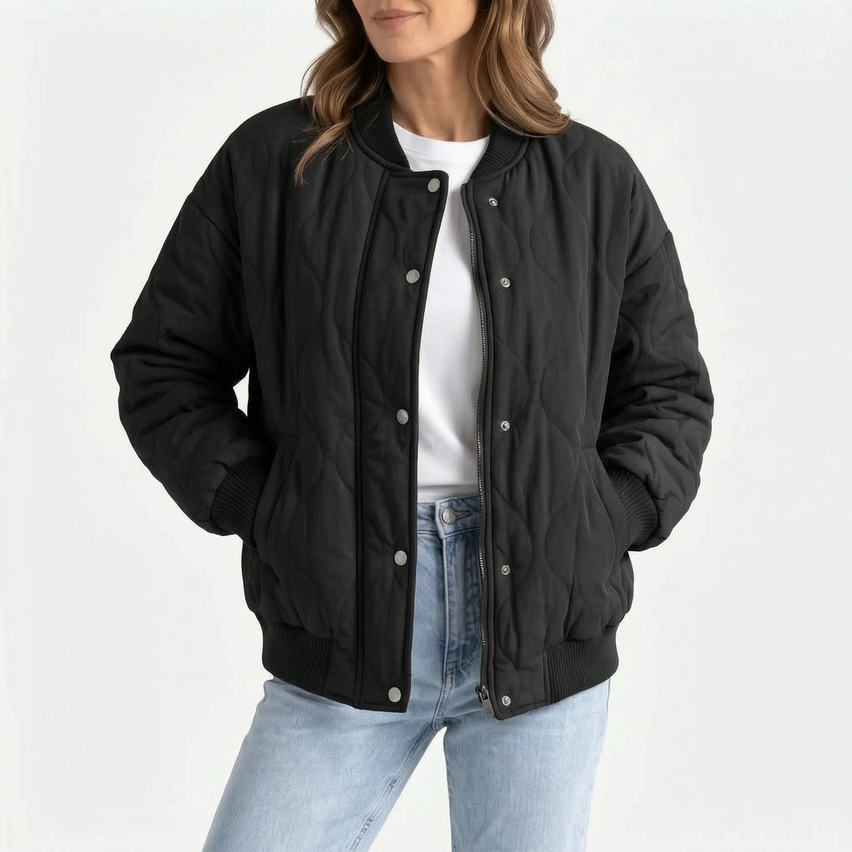 Women's oversized quilted bomber jacket with ribbed trim and front pockets