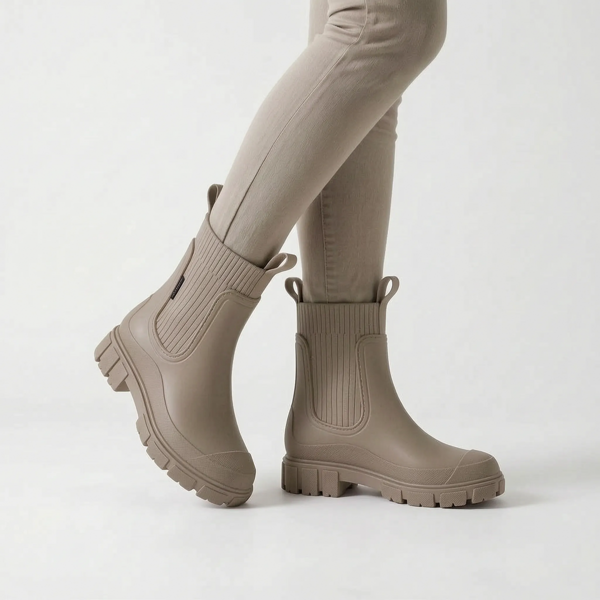 Women's ankle rain boots with ribbed shafts and chunky treaded soles